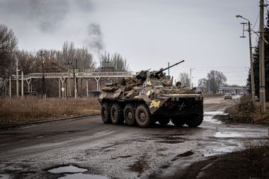 A tank drives by one of the main streets in Kostiantynivka, Ukraine on February 27, 2023.
