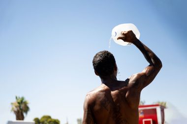 Man cooling off in heat wave