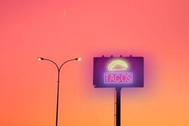 Neon sign for Tacos
