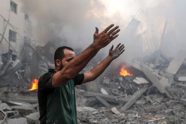 A man wails after Israeli airstrikes in Gaza City, Gaza on October 09, 2023. Search and rescue works continue.