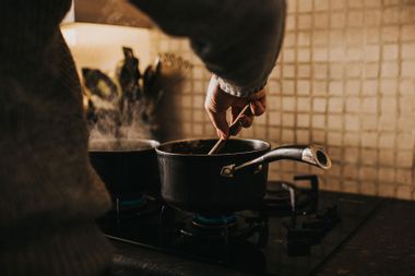 Stirring A Cooking Pot