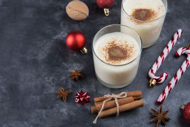 eggnog with cinnamon with christmas decorations