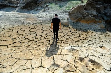 A man is seen walking in the area where the dam water recedes near Caglayan Bridge in Kirklareli, Turkiye on October 04, 2023.
