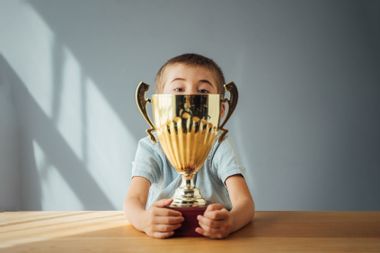 Child with trophy