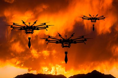 Military drones with a bombs at sunset