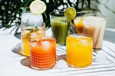 Various refreshing non-alcoholic drinks in glasses