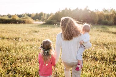 Mother with daughters in a field