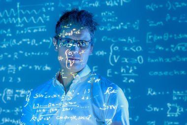 Scientist with math equations data projected