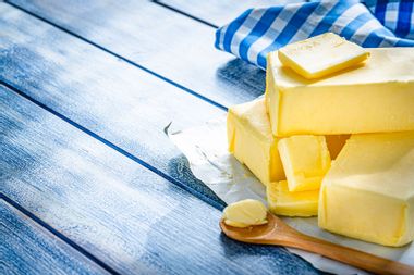 Butter blocks and pieces on blue table