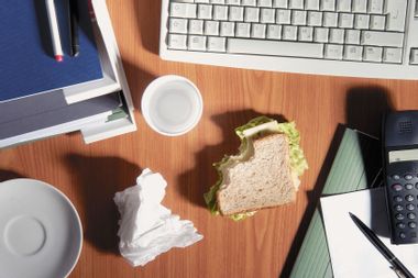 Office desk with a sandwich