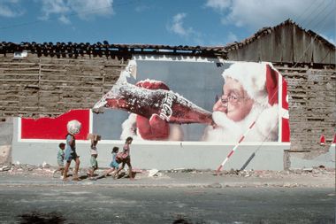 Walking by Crumbling Christmas Coca-Cola Billboard Nicaragua