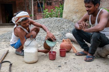 Man from Pasi community India serving toddy