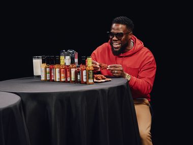 Image for “Hot Ones”: Kevin Hart defends his tequila brand and shares why he’ll never perform his own stunts