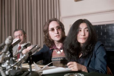 John Lennon, a former "Beatle" with wife, Yoko Ono, during a press conference on April 2, 1973.