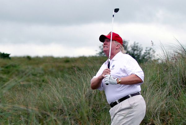 Republican group attacks president for golfing during coronavirus ...