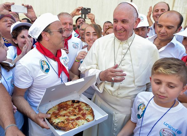Pope Francis invited 1,500 homeless people to a pizza party to celebrate Mother Teresa