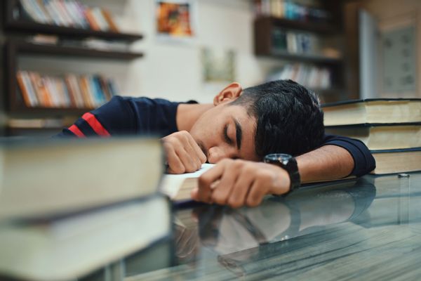 Teenage boy in the library