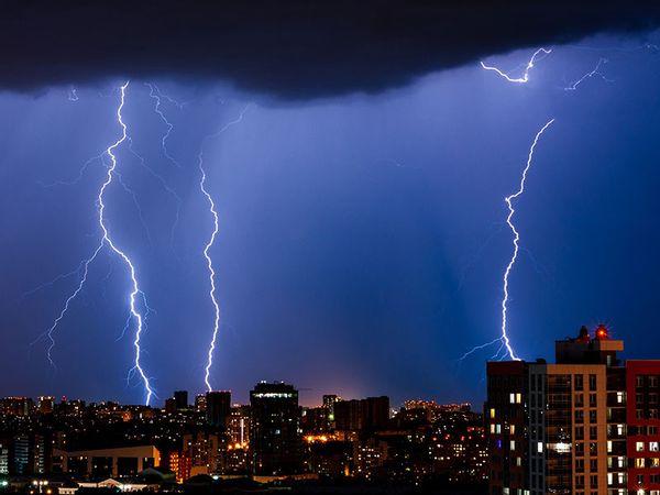 Lightning striking over the city