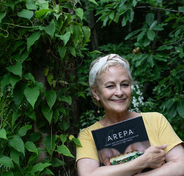 Irena Stein with her cookbook, Arepa