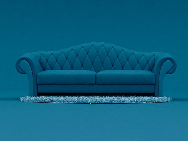 Blue sofa with light blue carpet