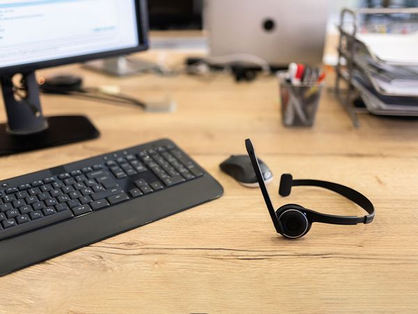 Call Center Headset Device At Office Desk