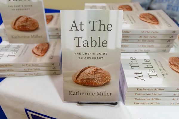 Table display of At The Table by Katherine Miller