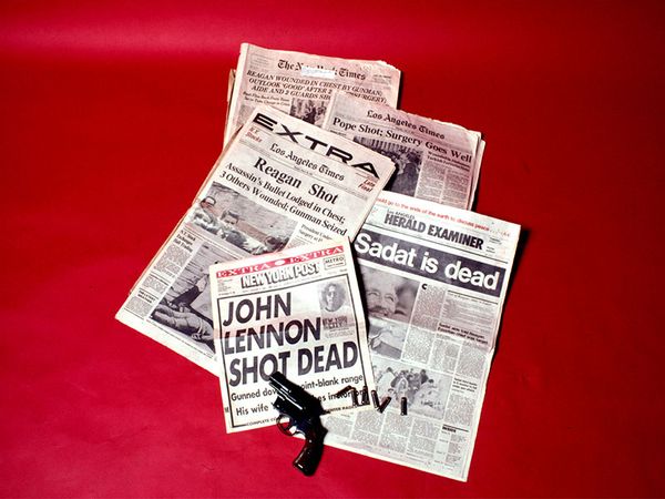 Newspaper headlines Reagan Sadat Lennon shot shooting