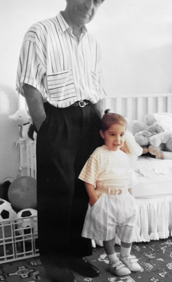 Childhood photo of the author with her father