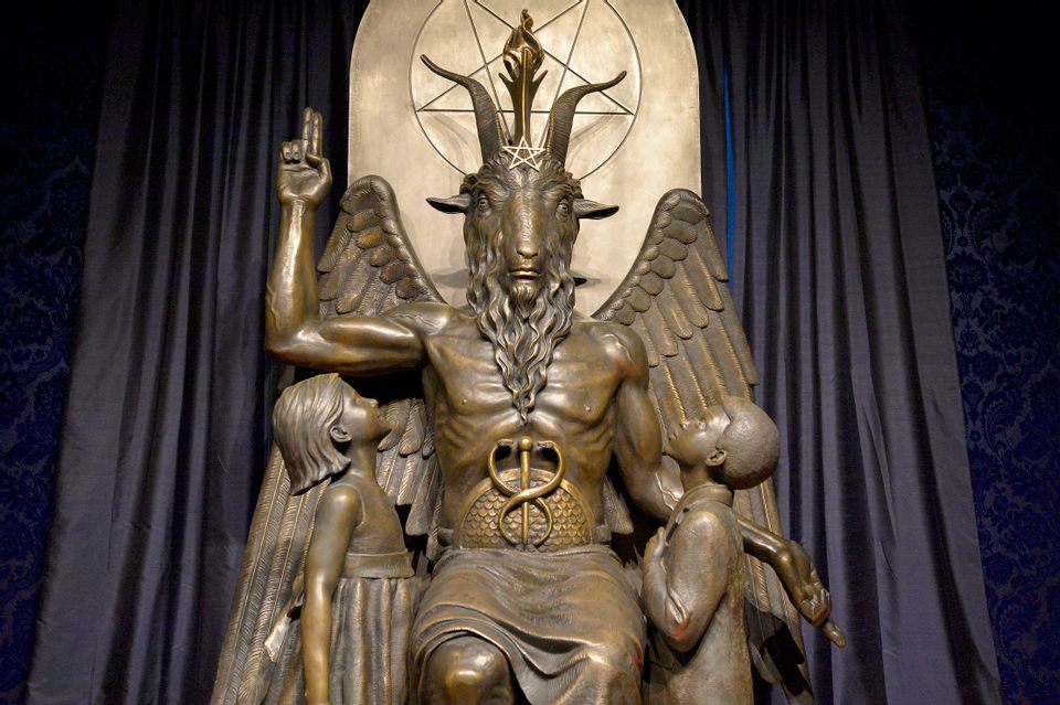 The Baphomet statue is seen in the conversion room at the Satanic Temple in...